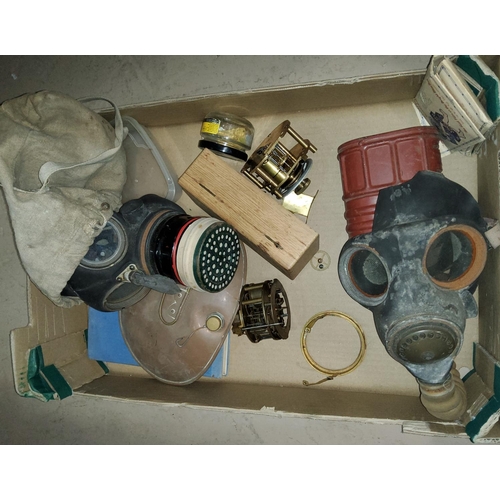 90 - 2 vintage gas masks, a selection of cigarette cards, clock parts, metalware etc