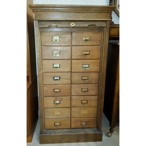 902 - A filing cabinet with tambour front, fitted 16 drawers, 62 cm