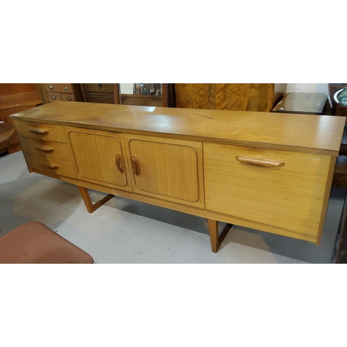 927 - A mid 20th century teak long low sideboard by Stateroom