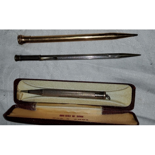 95 - 3 propelling pencils 1 of which hallmarked silver, 1 white metal, 1 gilt