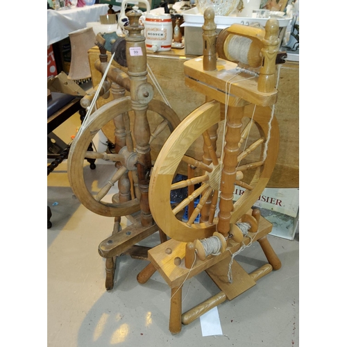 99 - A 19th century spinning wheel reproduction spinning wheel with treadle action