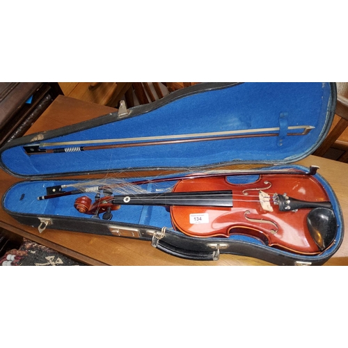 134 - A modern cased violin plus 2 bows length 34cm