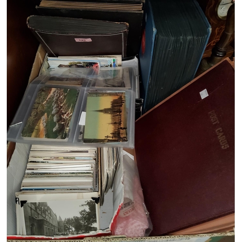 145 - A large quantity of vintage postcards, various subjects, loose and in albums; an unused album, boxed