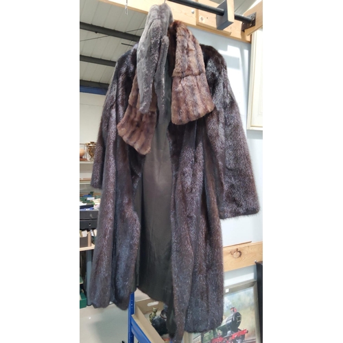 78 - A 1950's mink coat, medium size; 2 fur collars