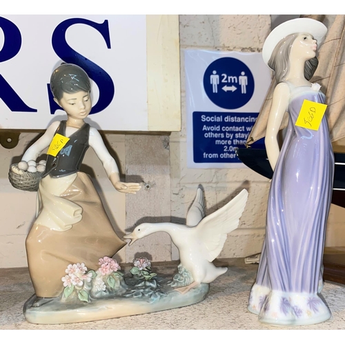 506d - A Lladro figure of girl being chased by a goose and a Lladrofigure of girl with hat numbered 5644... 