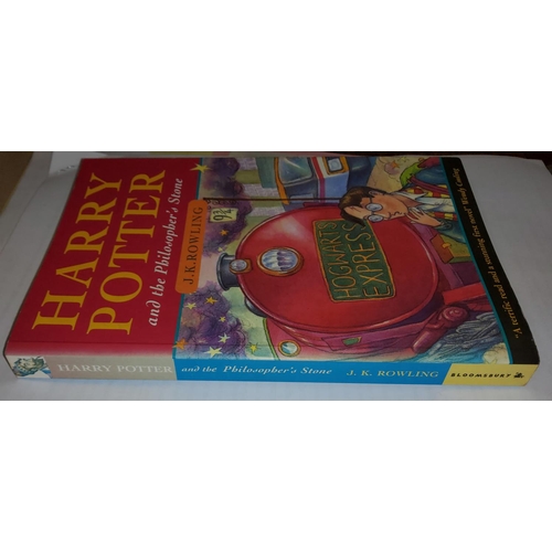 299 - J.K.ROWLING - Harry Potter and the Philosopher's Stone, soft cover, FIRST EDITION with copyright tex... 