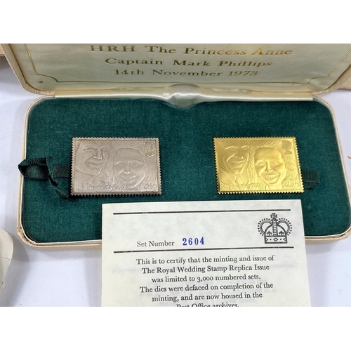 741 - A pair of HRH Princess Anne 1973 Royal Wedding commemorative medallic replica stamps, 20 pence in 22... 