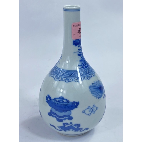 436 - A Chinese blue and white bottle vase decorated with vases etc, height 17cm