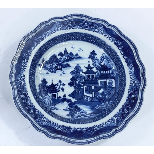 444 - A Chinese scalloped edge blue and white dish, diameter 24.5cm