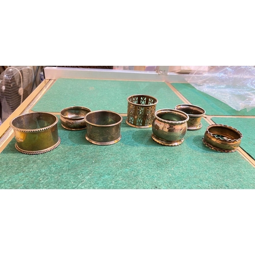 716 - A selection of various hallmarked silver napkin rings, various dates and assay offices, gross 4.3oz