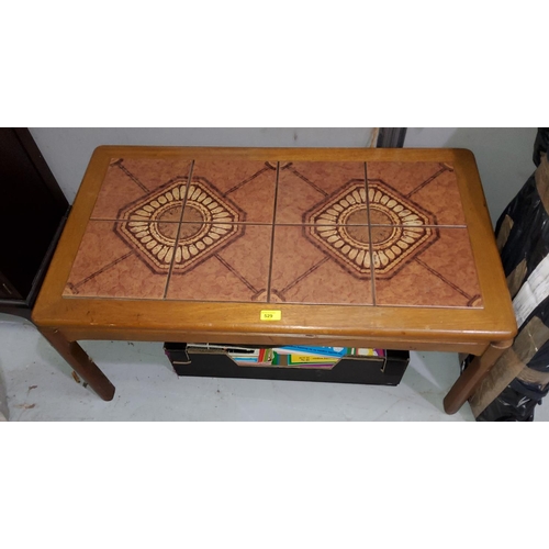 936 - A 1960's teak tile top coffee table