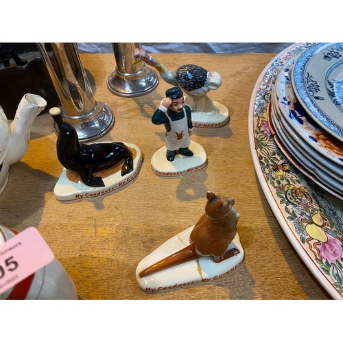 505 - A small selection of Guinness figures, a small ceramic barrel etc