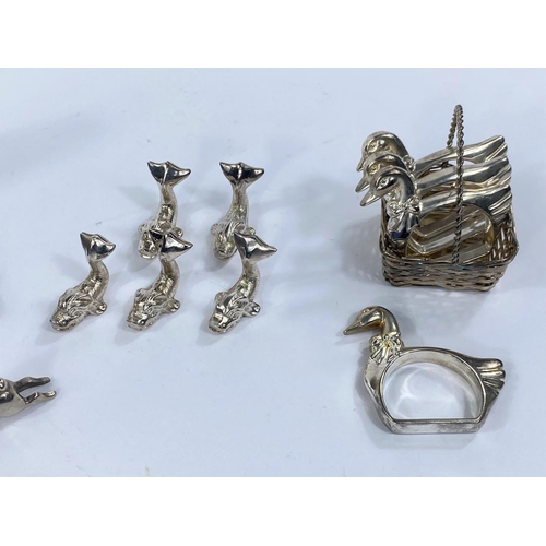 631 - A Selection of silver plated menu holders etc in the form offish, ducks and others