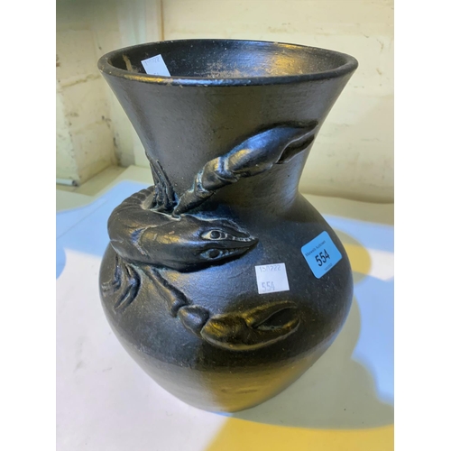 554 - A Japanese pottery vase of bulbous form with lobster in relief under a 'bronzed' effect glaze
