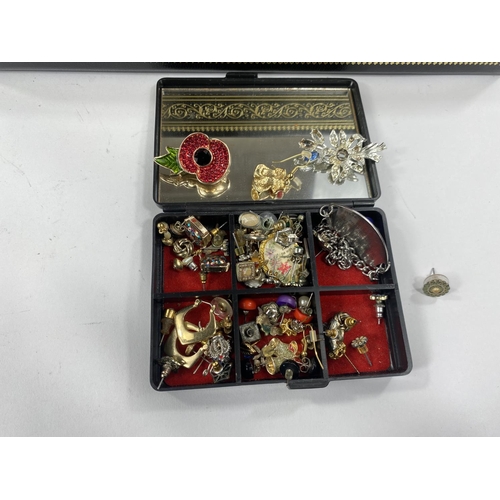 722A - A good selection of costume jewellery, watches etc. in a jewellery box.