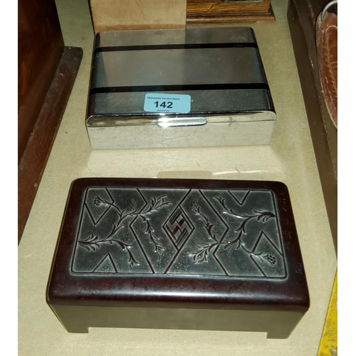 142 - An Art Deco chrome and black cigarette box and a similarBakelite box