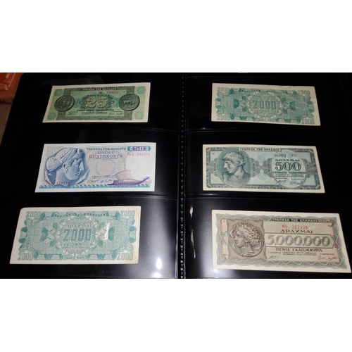 201 - An album of World bank notes including Chinese, Japanese and other examples
