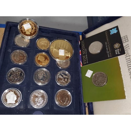 211 - A collection of modern commemorative coins in presentation case
