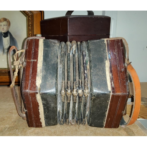 60 - A 19th century concertina case, Campbells Non-Pareil, and a Butler concertina with 10 buttons to eit... 