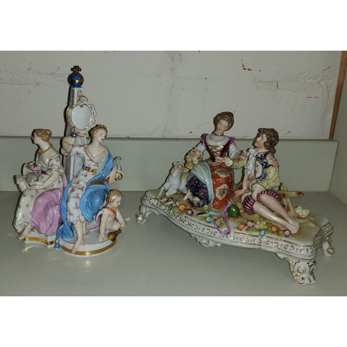 615 - A Meissen group of women in crown, next to a woman with a horn. (some areas of loss, damage and rest... 