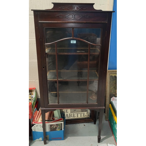 816 - An early 20th century small mahogany display cabinet enclosed by single glazed door, on square taper... 