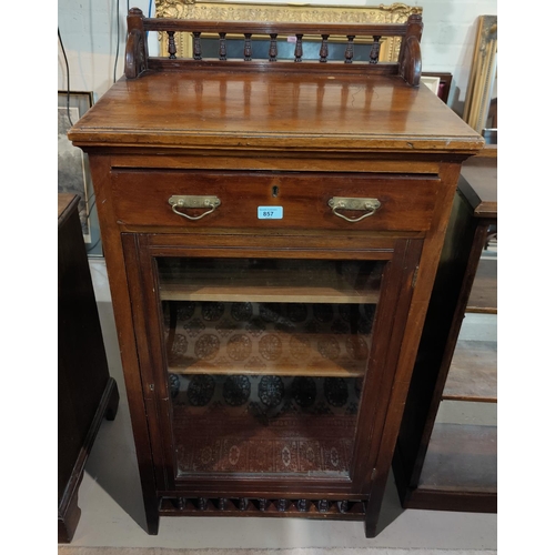 857 - An Edwardian mahogany music cabinet enclosed by glazed door, with frieze drawer