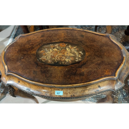 867 - A 19th century oval jardinière table in the Louis XV style, with ormolu mounts, metal liner and marq... 