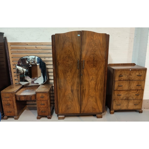 878 - A 1930's 4 piece bedroom suite in figured and quarter veneered walnut, comprising double wardrobe (n... 