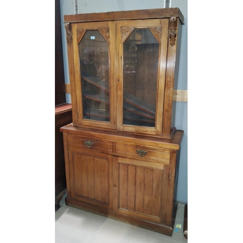 886 - An Edwardian mahogany full height bookcase with 2 glazed doors over 2 drawers and double cupboard