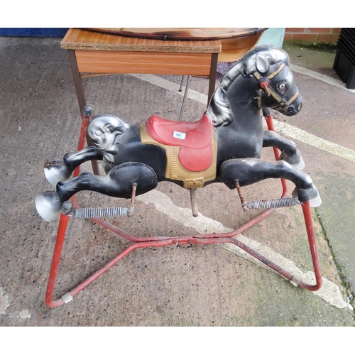 901 - A 1930's metal rocking horse with spring action