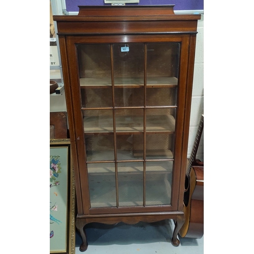 903 - An Edwardian inlaid mahogany china cabinet enclosed by single door