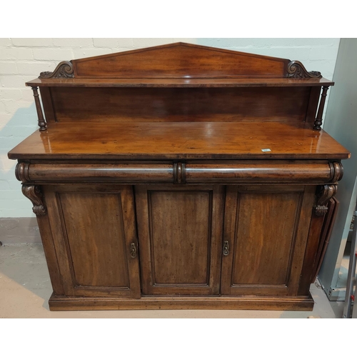 904 - A mid 19th century chiffonier with low raised back, 2 pulvinated frieze drawers and 3 cupboards unde... 