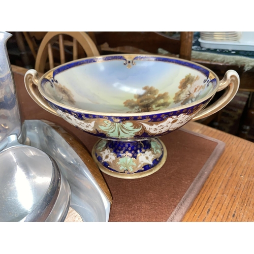 479 - A Noritake two handled bowl on stand, Wade Disney figures and four pieces of Picquot Service