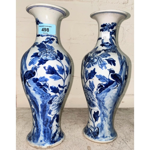 498 - A pair of 19th century Chinese blue and white baluster vases, naturalistic decoration, 4 character m... 