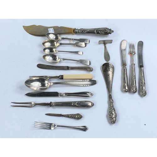 725 - A selection of silver handled and other decorative cutlery.