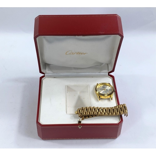 730B - A gilt metal cased watch and strap; a Cartier Morocco box; vintage jewellery etc.
