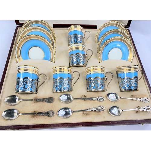 730C - A CRESCENT bone china coffee set, the 6 cups with pierced silver galleries and handles, with matchin... 