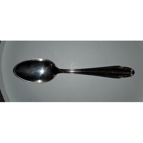 199 - A German WWII party tea spoon, stamped with eagle overswastica dated 1942