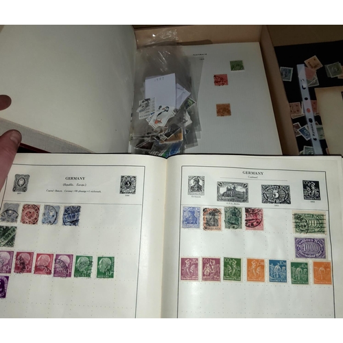 244 - A Strand album with a vintage collection of stamps; a collection of world stamps