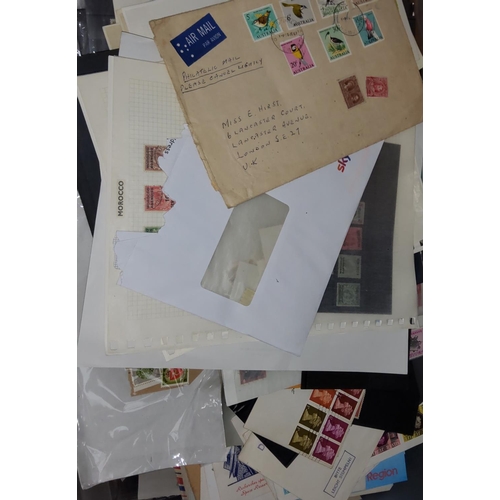 263 - A box of World stamps; covers; etc.