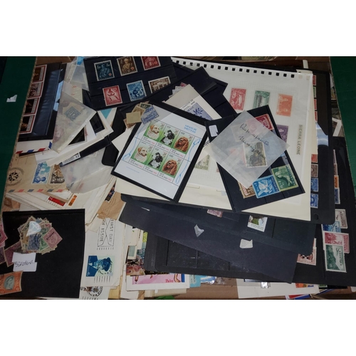 264 - A box of World stamps; covers; etc.