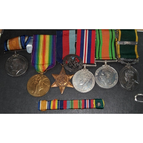 318 - WWI/WWII:  a group of 6 medals to 42047 Pte E Gradwell Lan.Fus/3440854 Fsr (to Territorial meda... 