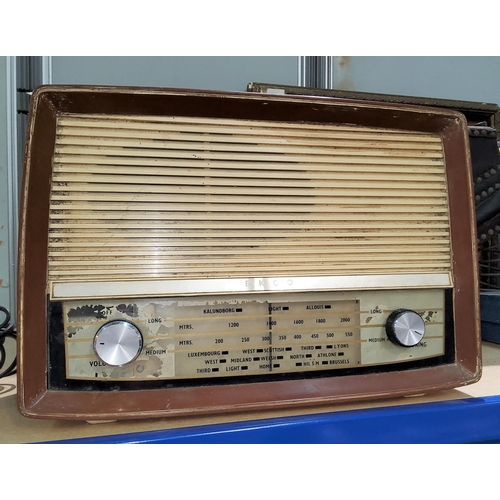 176 - A BUSH bakelite brown mottled radio (one dial a.f); and an Ecko radio (a.f)