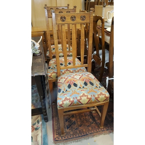781 - A set of 6 oak Arts and Crafts rail back dining chairs with squared tapered legs, other carved embel... 