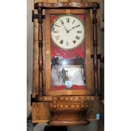 790 - A marquetry cased American wall clock with bell chime (in need of some care and attention)