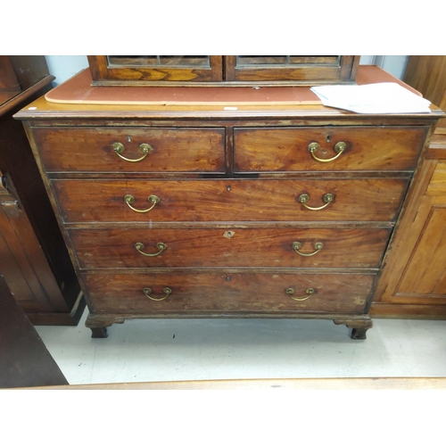 810 - A Georgian mahogany large chest of 3 long and 2 short drawers with brass drop handles, on ogee brack... 
