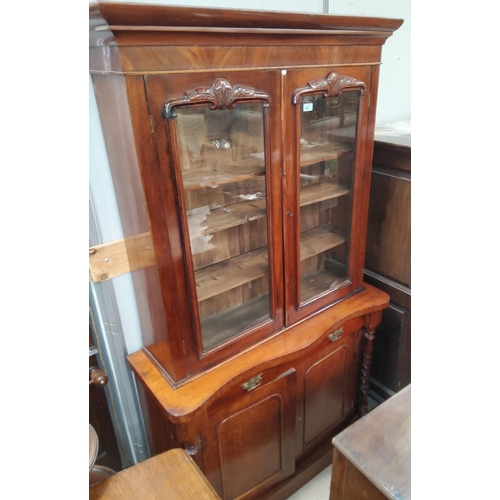 883 - A Victorian mahogany full height bookcase with moulded cornice and 2 glazed doors over frieze drawer... 