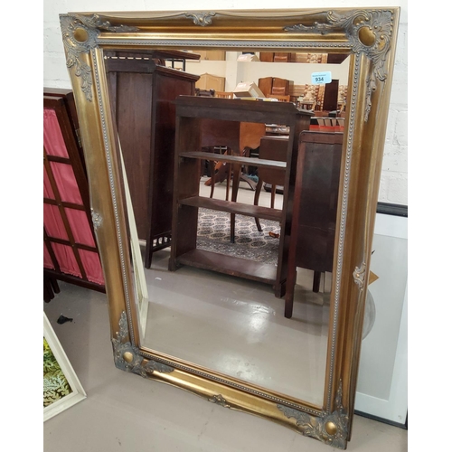 934 - A large gilt framed wall mirror, 45 x 30cm