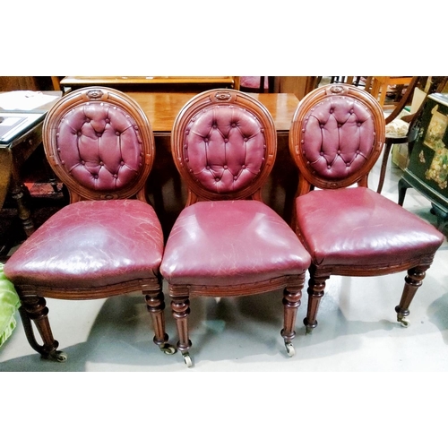 942 - Six mahogany balloon back chairs with leather button backs and overstuffed leather seats in red