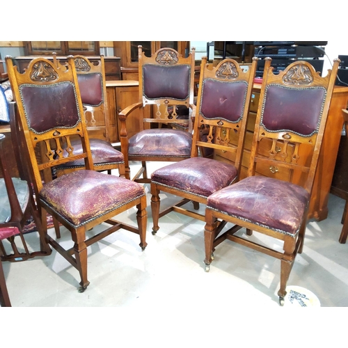 943 - 8 Art Nouveau oak dining chairs (6+2) with red leather inserts, carved decoration, tapering uprights... 